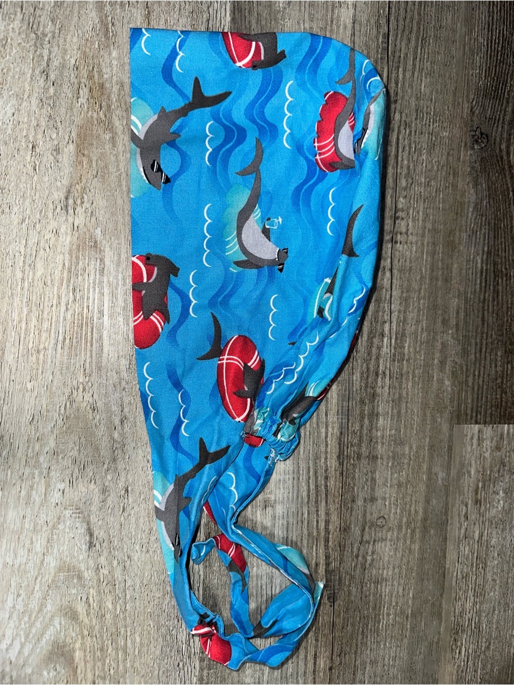 Shark tie-back surgical cap
